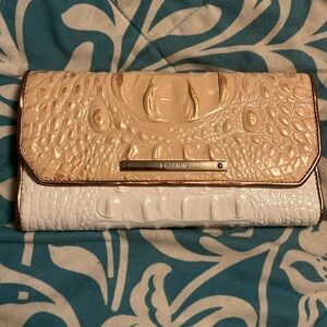 Brahmin cream & white wallet with copper detail.